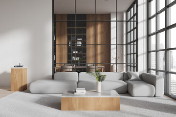 Home living room interior with relaxing and dining zone, panoramic window