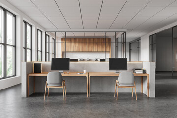 Stylish business room interior with coworking and conference zone, window