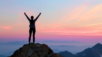 Woman Reaching The Top Of A Mountain At Sunset