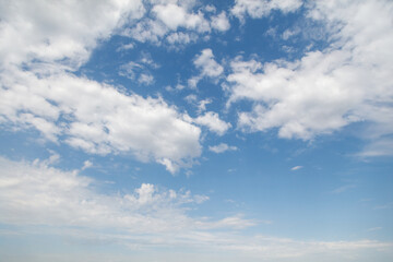 The sky is blue and clear with a few clouds scattered throughout