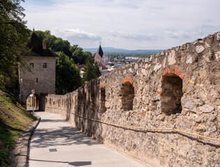Trenčín Castle rises on a steep limestone cliff directly above the town of Trenčín, and we can reach it by a steep path along the walls between the watchtowers. © Marek