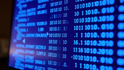 Obraz premium Binary Code on a Computer Screen Blue Digital Numbers