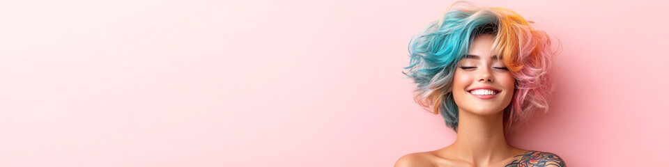 Naklejka premium Happy young woman with colorful hair smiling against a pink background