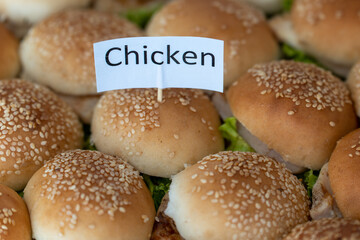 Tasty Chicken Lettuce Buns: Sesame Seed Bread and the Hungry Games Concept.