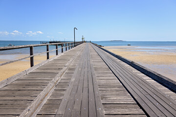 Timber wooden jetty pier, Kingfisher Bay, K'gari Fraser Island, travel tourism destination, summer...