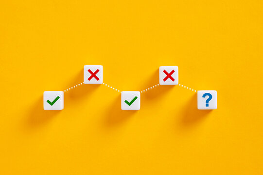 Question mark and check and cross marks forming chart on yellow background