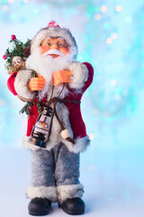 Christmas or New Year Santa Claus blue and turquoise bokeh background