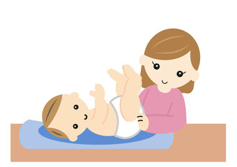 オムツを替える若い母親