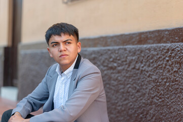 Fototapeta premium Portrait of pensive young man outdoors