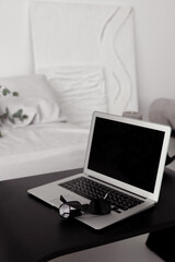 laptop in a modern interior in minimalist style  - Image