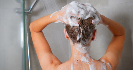 Woman Washing Hair in the Shower, Enjoying Relaxation