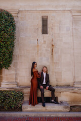 A beautiful moment captured the deep connection between a diverse couple during their engagement photoshoot, symbolizing their profound love, unity, and joyful celebration of their bond