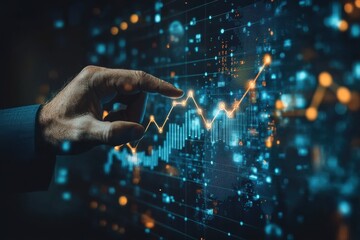A hand is pointing at a graph on a computer screen