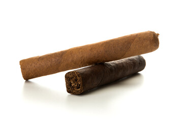 Two cigars isolated on white background