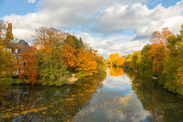 Colorful foliage at Alster river, Hamburg, in autumn