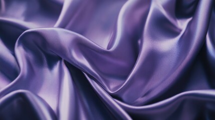 Obraz premium A detailed shot of purple satin fabric draped elegantly, with intricate folds and soft shadows creating a luxurious texture.