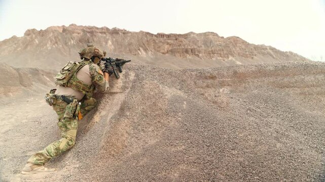 Action soldiers carry sniper rifles to fight protect maintain peace and independence along international borders prevent invasion and terrorism : Infantry carefully patrolling the war zone.