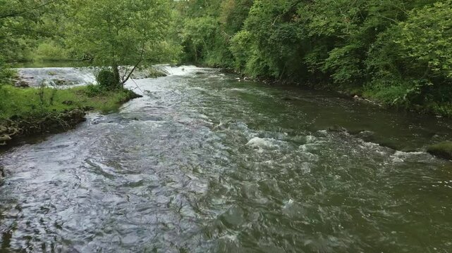 Sarthe River, Toy&egrave;res Canyon, Saint-Pierre-des-Nids, France. Aerial forward at low altitude
