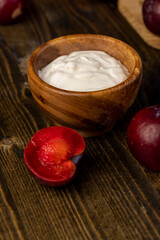 yogurt made from milk and red ripe plum