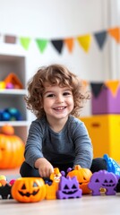 Fototapeta premium A child joyfully arranges colorful pumpkin toys in a bright Halloween-themed playroom