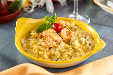 Delicious Baked Seafood in Cheesy Sauce with Fresh Herbs and Garnish