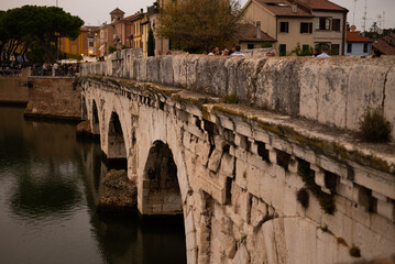 Discover the iconic Ponte di Tiberio, a Roman bridge spanning the River Marecchia in Rimini, Italy. Built in 20 AD, this majestic structure is a testament to Roman engineering and a must-see