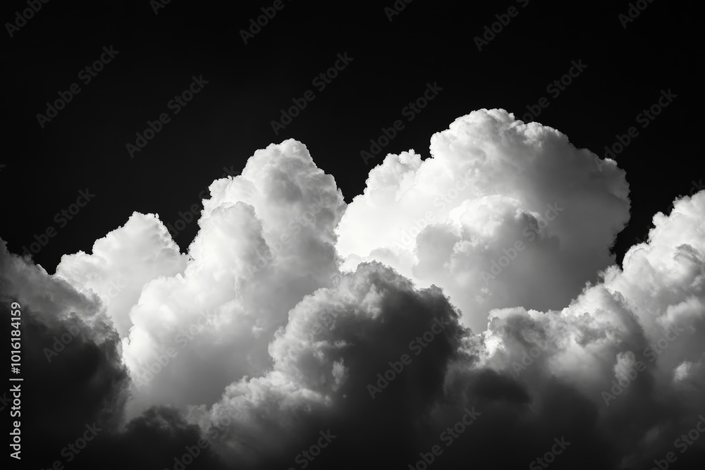 Poster A dramatic cloudscape featuring towering clouds with contrasting light and dark tones, evoking a sense of awe and introspection in a majestic atmosphere.