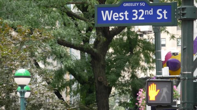 New York City crossroad, Manhattan Broadway street intersection road sign. Midtown district, Greeley, Herald Square, United States. NYC subway globe, metro entrance orb lamp, traffic light, roadsign.