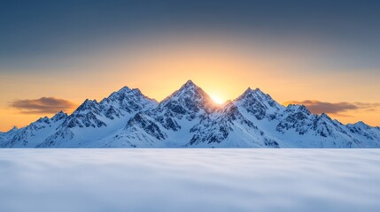 Glorious winter sunrise over snow-capped mountains with untouched snowfields and soft light on the peaks 