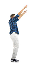 A man, full-length, on a white background, raised his hands up