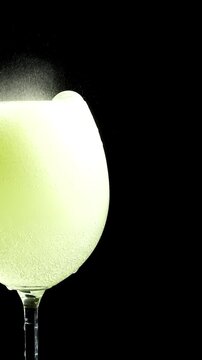 Foamy substance dissolving in water glass on bedstand fizzing poison in a glass 
