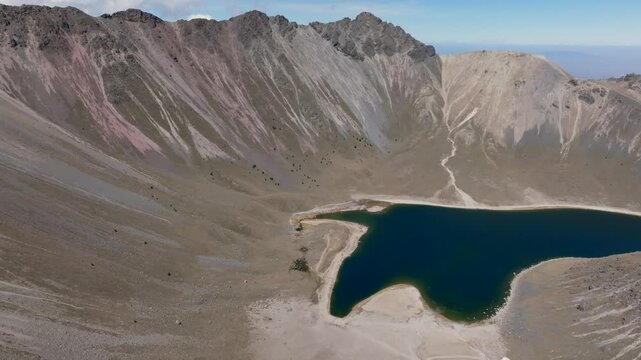 Dolly-in flight over Laguna del Sol at Nevado de Toluca reveals mountain hikes and the Quetzal Pass, Mexico