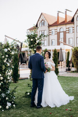 Fototapeta na wymiar wedding ceremony of the newlyweds on the glade