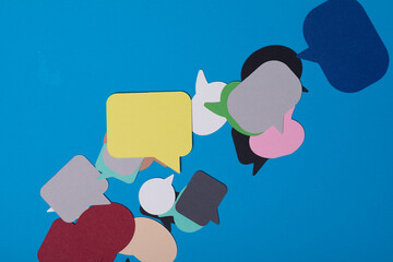 Colorful speech bubbles on a blue background ready for your message