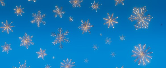 Falling Snowflakes on a Blue Sky