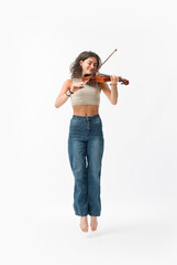 Musician playing the violin and jumping