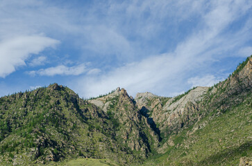 Beautiful Green Field Green Hills, Storm and sun contrast weather. Photo nature Background