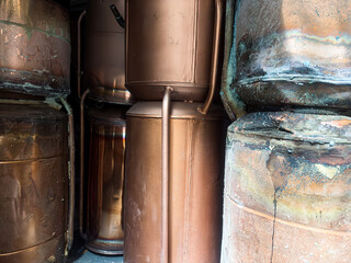 Old copper cylinders, water tanks, taken from a loft or airing cupboard during a new boiler swap,...