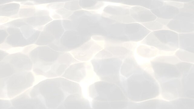 light Blue water with ripples on the surface. Defocus blurred transparent clear calm water surface texture with splashes and bubbles. Water waves with shining pattern texture background.