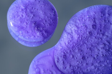 blond preserve purple shampoo on a mirror background with sky and clouds, 