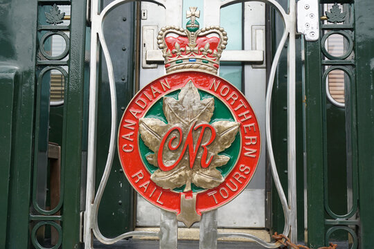 The badge of the Canadian Northern rail tours on the rear of a Canadian Northern Pullman car at the British Columbia railway Museum , Canada