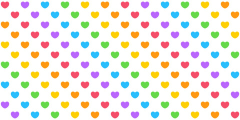 Cute seamless pattern of rainbow colored hearts on white background. Colorful and bright repeating pattern design. Vector illustration.