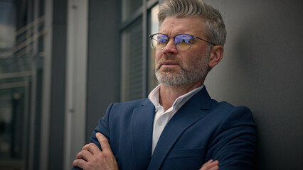 Pensive Caucasian middle-aged old man thinking thoughtful serious senior businessman think looking...