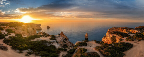 Praia da Mesquita sunrise with rocks and colour sky © Jaro