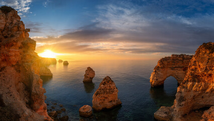 Praia da Mesquita sunrise with rocks and colour sky © Jaro