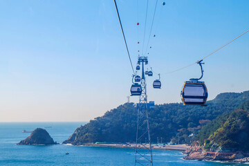 Beautiful landscape of cable car transportation system for tourist traveling at songdo beach, this place is one of the famous tourist destination in Busan, South Korea