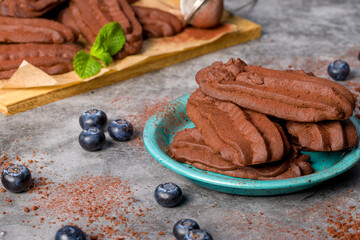 Chocolate shortbread cookies. Light background.