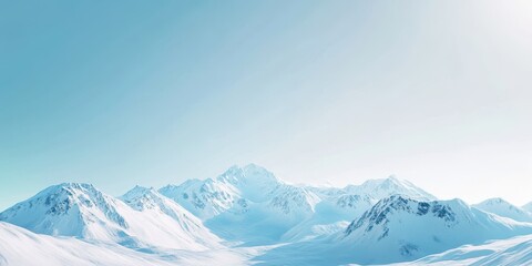 Fototapeta premium Serene winter landscape with majestic snowy mountains and clear blue sky, perfect for travel and nature-themed projects.