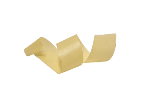 A yellow masking tape twisted into rings lies on a white background.