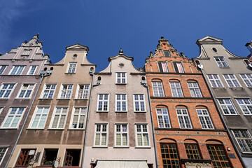 facades of historic tenement houses in the city of Gdansk